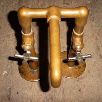 Brass deck-mount faucet