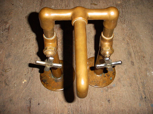 Brass deck-mount faucet Image