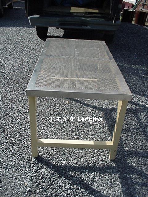 Perforated stainless tables Image